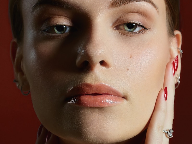 Close portrait of a woman with an even sun-kissed glow